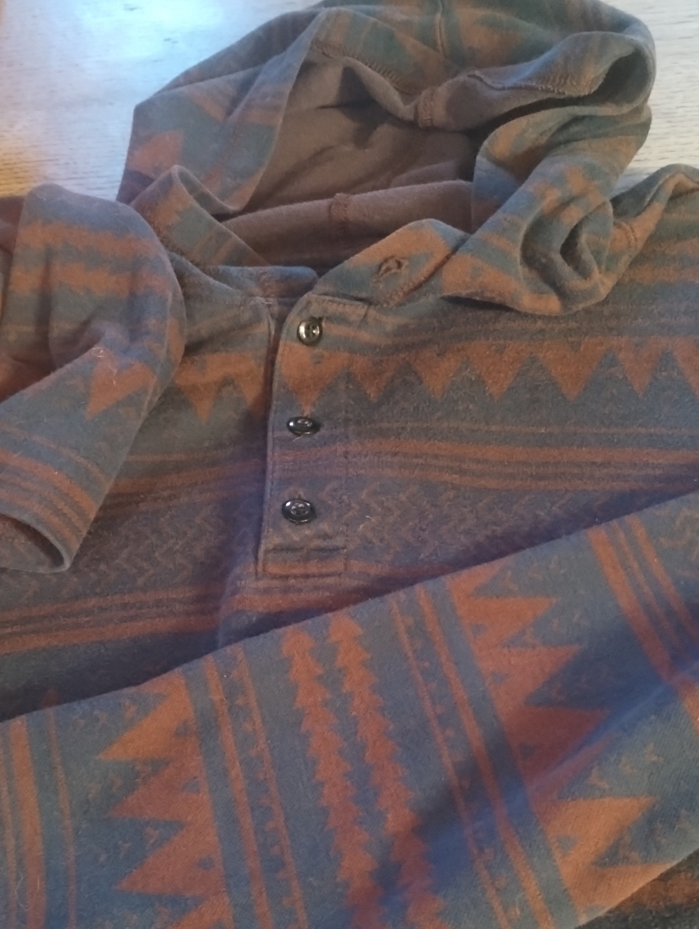 on the byas Men's Button Up Hooded Sweater in Burgundy and Navy Blue Aztec Print